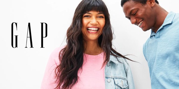 A man and woman smiling