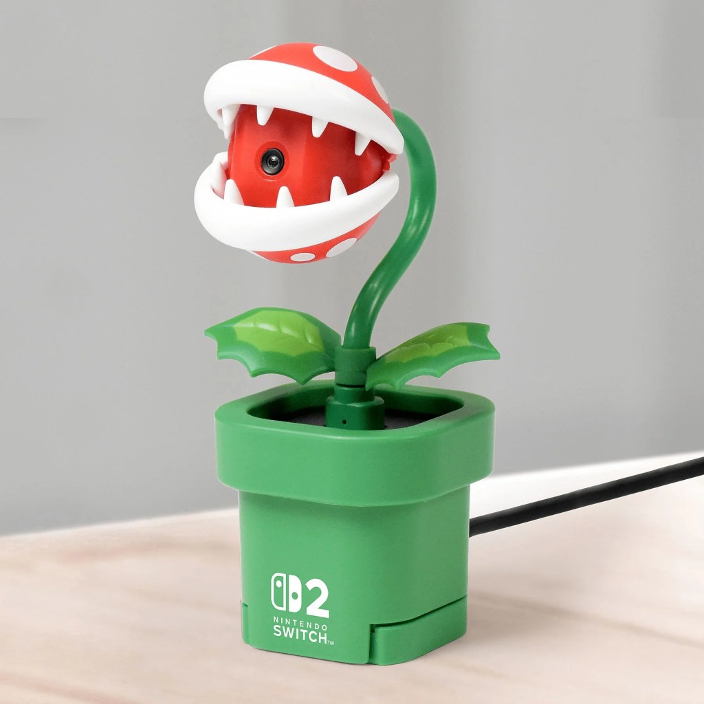 A toy plant with a red and white plant