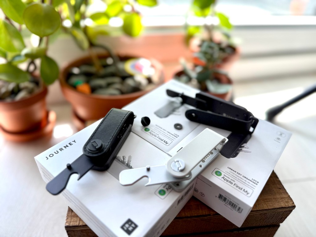 A stack of boxes with a black strap on top