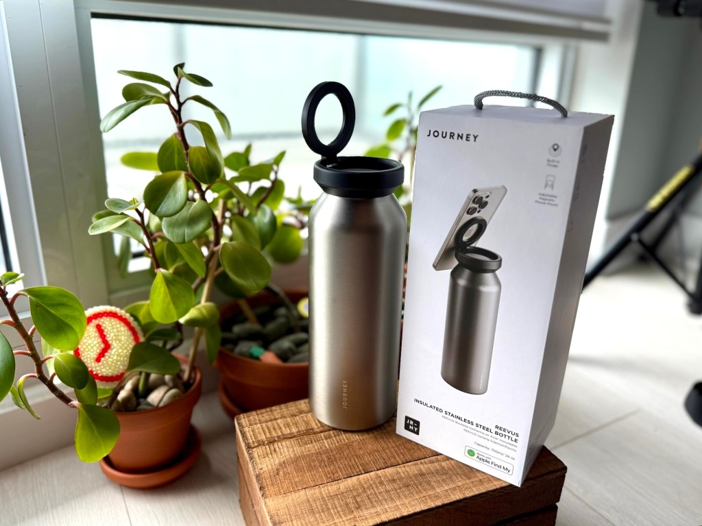 A bottle and box on a table