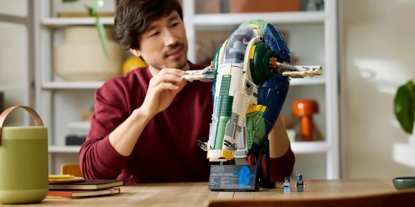 A man playing with a toy