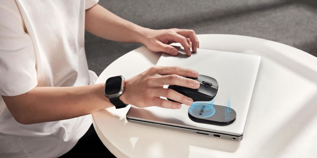 Image showing a person magnetically attaching ESR's MagMouse.