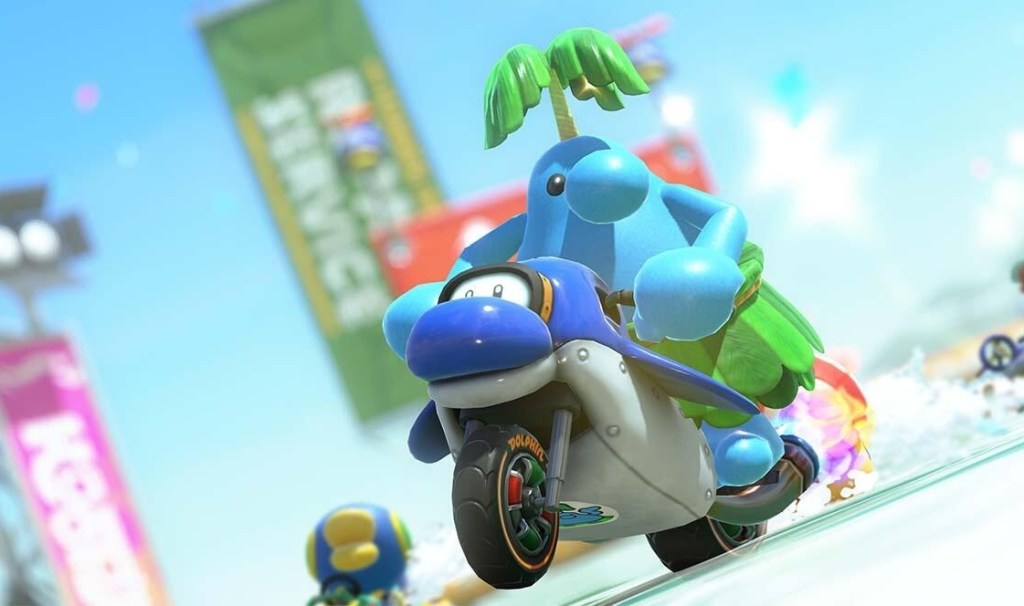 A blue cartoon character riding a motorcycle