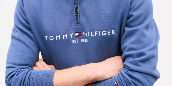 A person with arms crossed