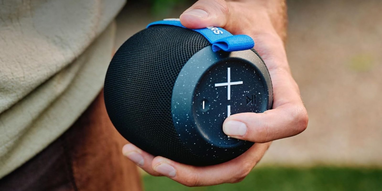 Image showing a person holding Ultimate Ears' WONDERBOOM Play bluetooth speaker.