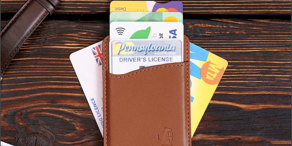 A wallet with credit cards and a few other cards