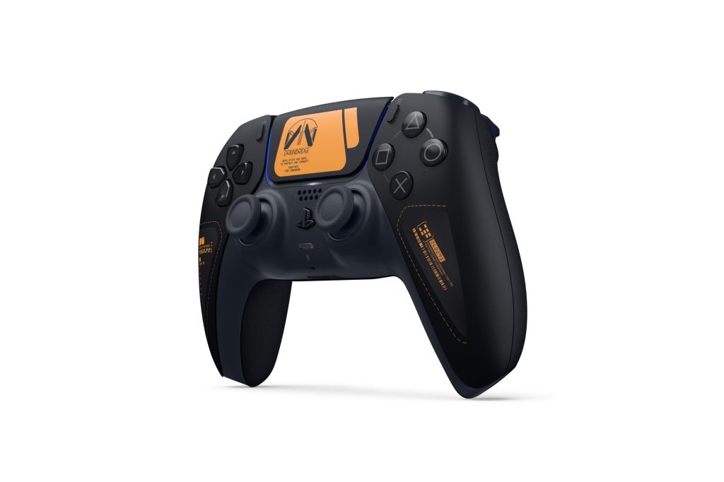 A black and orange video game controller