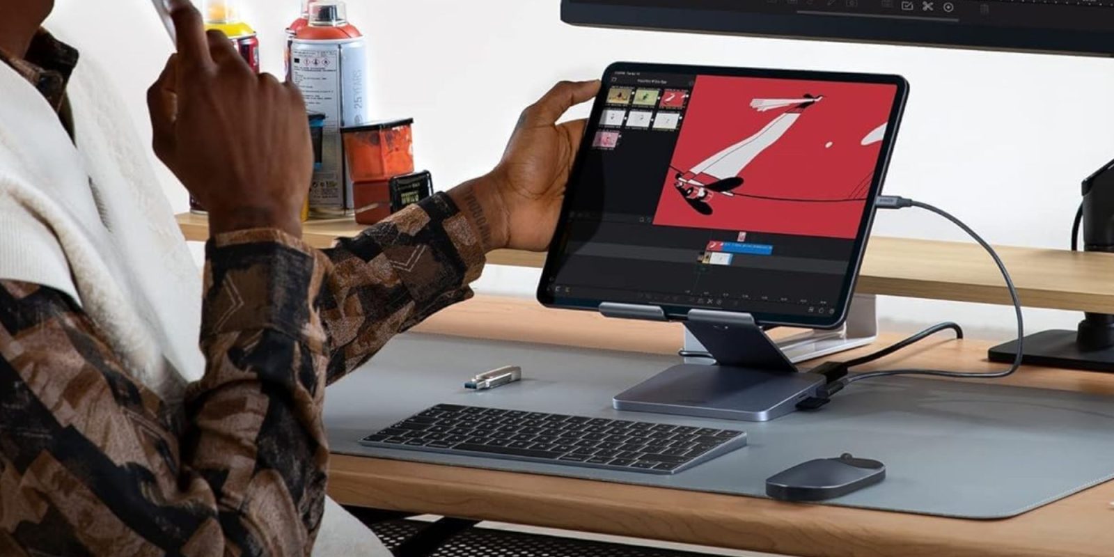 Image showing a person using Anker's 8-in-1 USB-C hub for iPad.