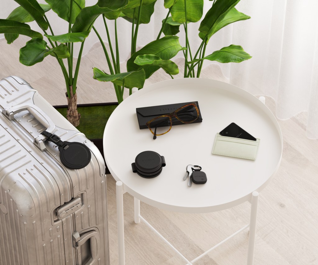 A table with luggage and objects on it