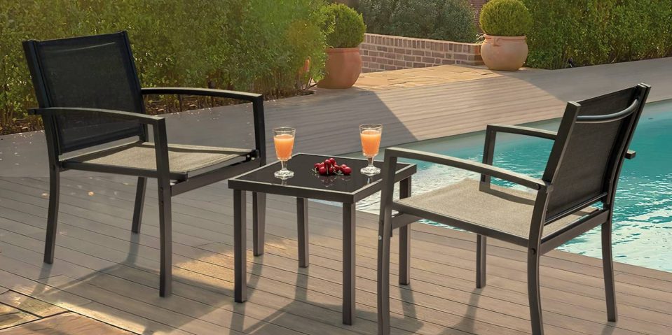 A table and chairs on a deck
