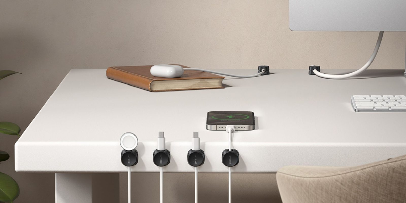 Image showing Lamicall's clip holders in use on a desk.