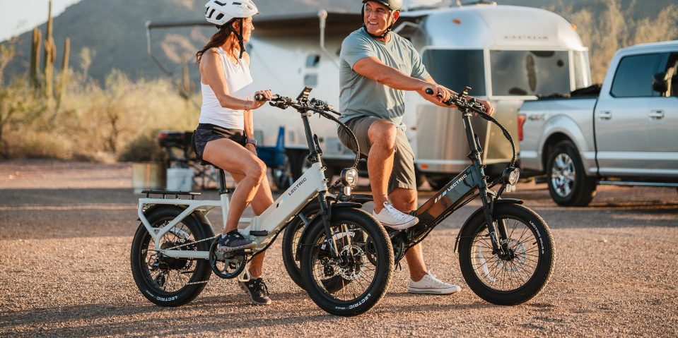 A man and woman on bicycles