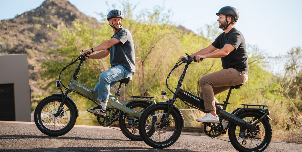 Two men riding Lectric's XP4 e-bikes