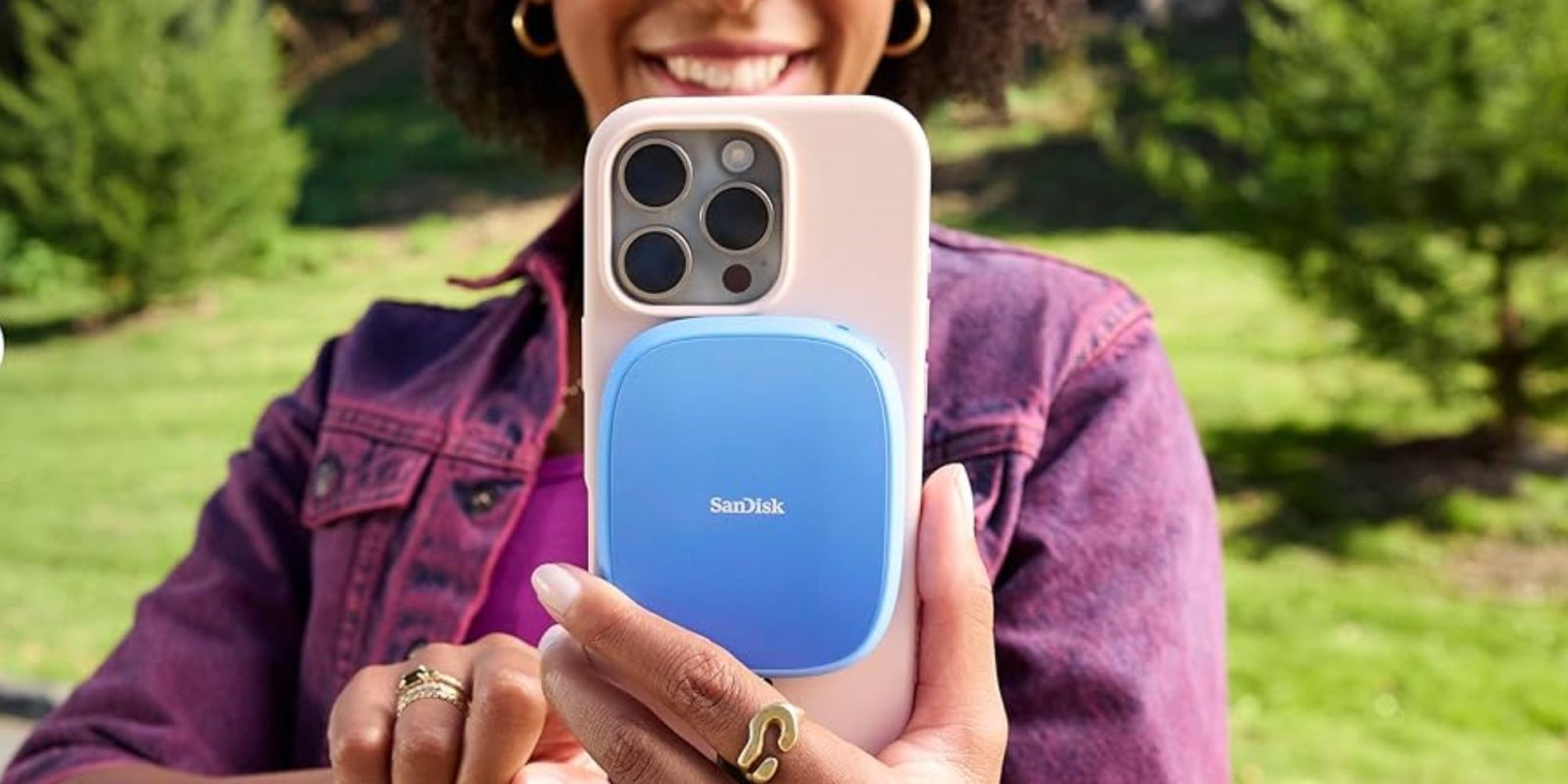 Image showing a person holding SanDisk's Creator Phone SSD.