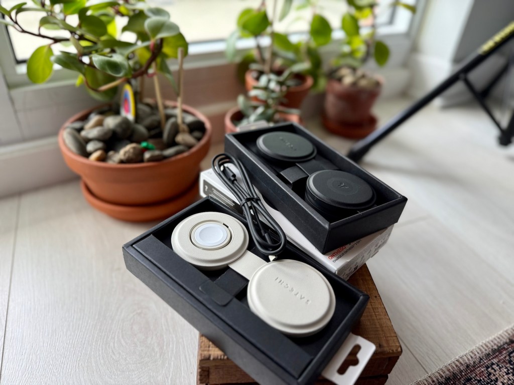 A black box with white circles and cord in it