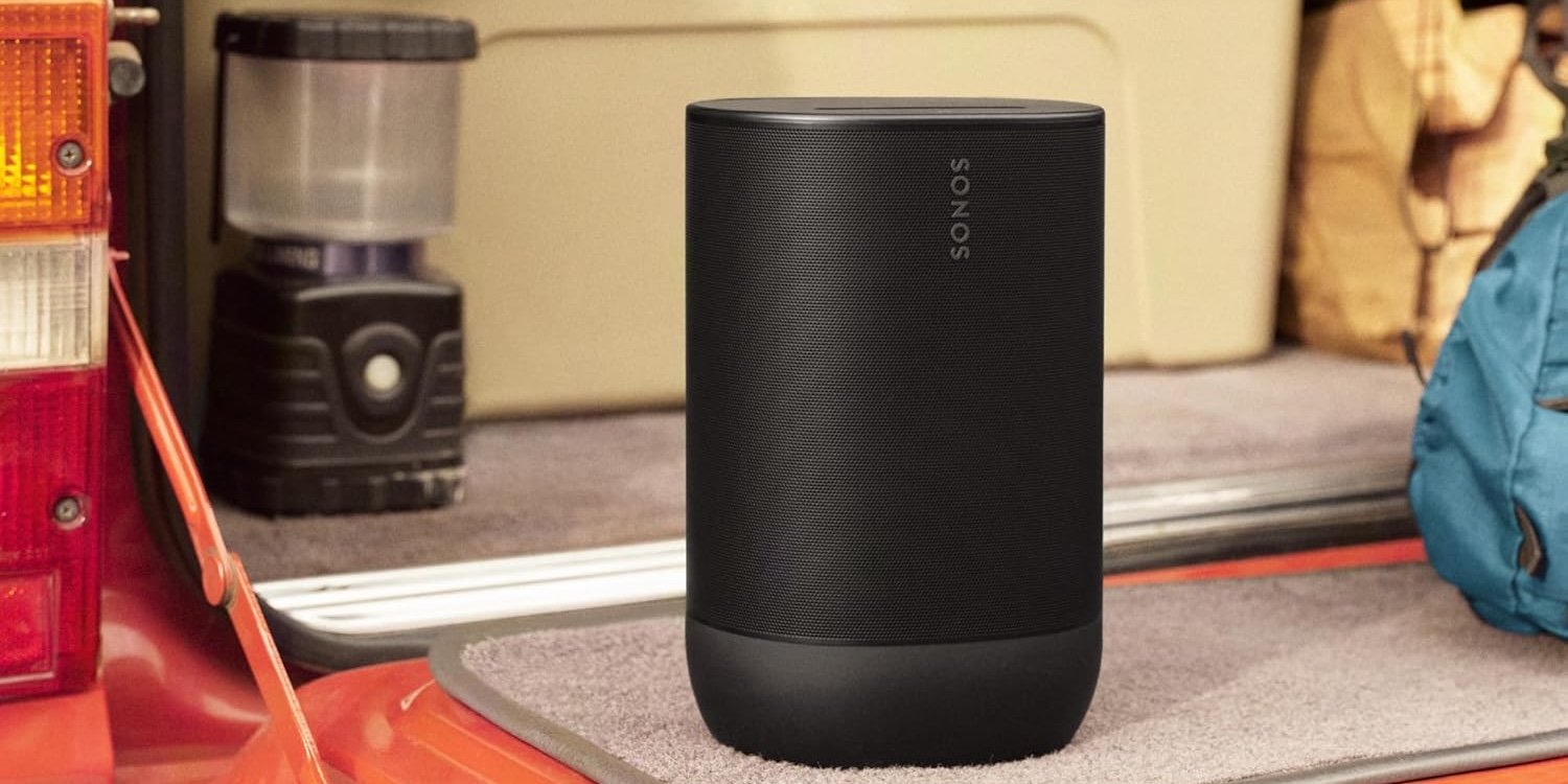 A black speaker on a rug