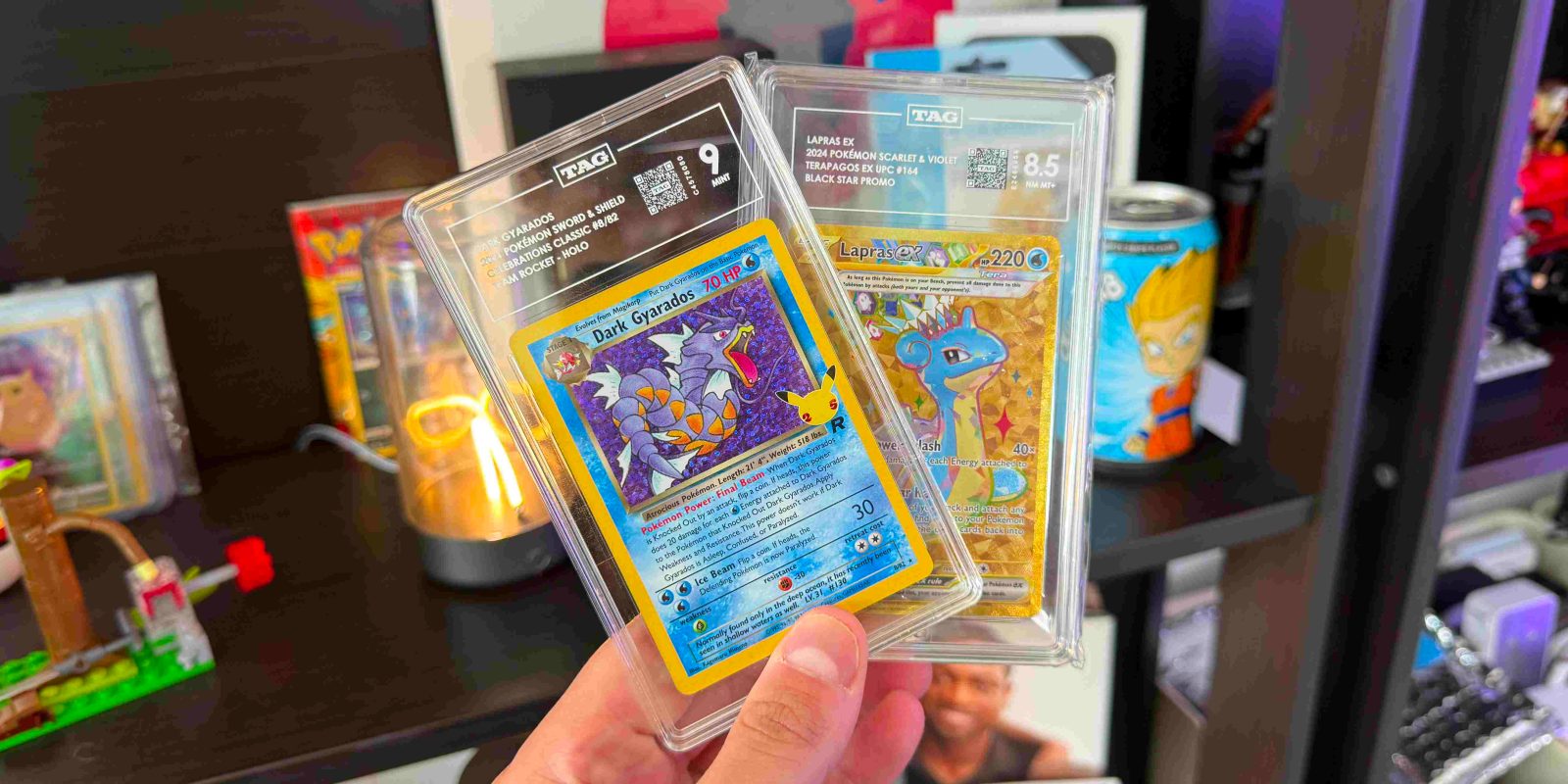 A hand holding a plastic case with a card in it