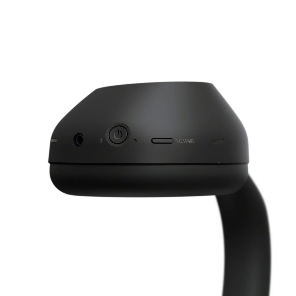 A black object with a curved neck