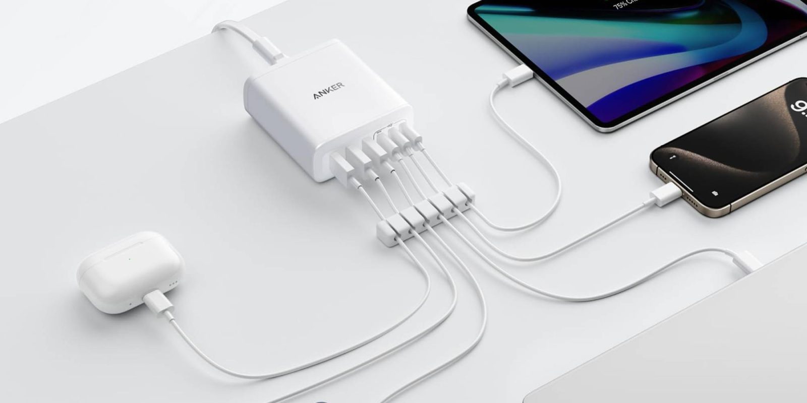 A phone charging station with many cables