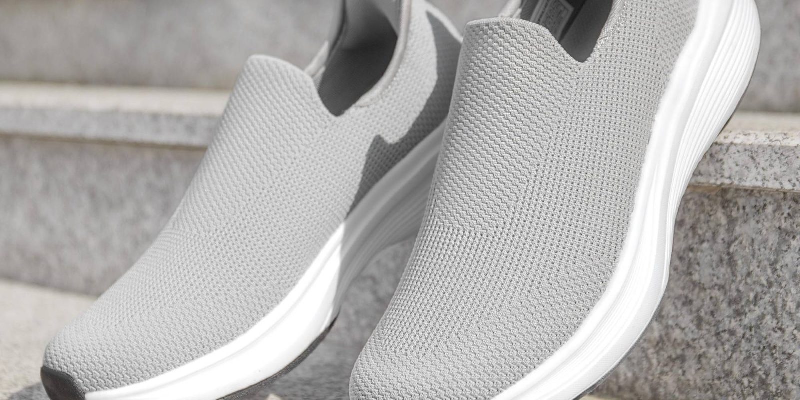 A pair of grey shoes