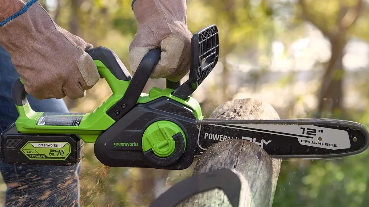 A person using a chainsaw