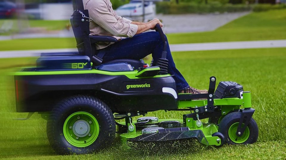 A person riding a lawn mower
