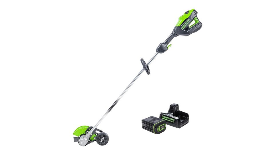 A green and black lawnmower