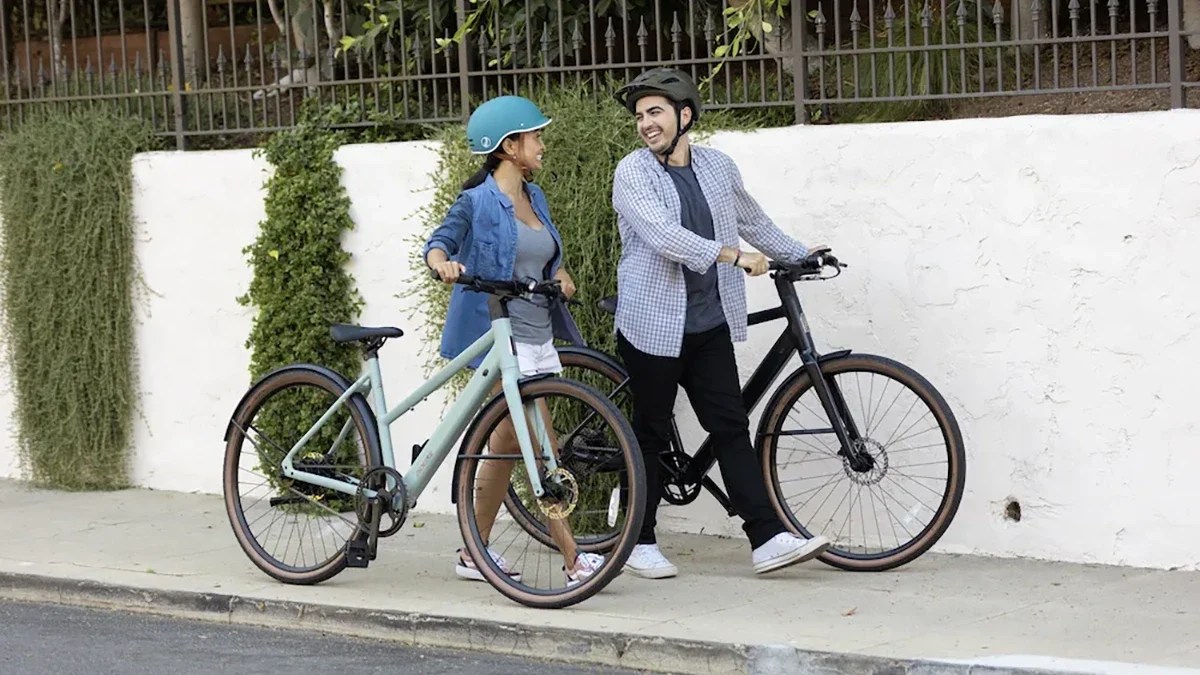 A man and woman with bicycles