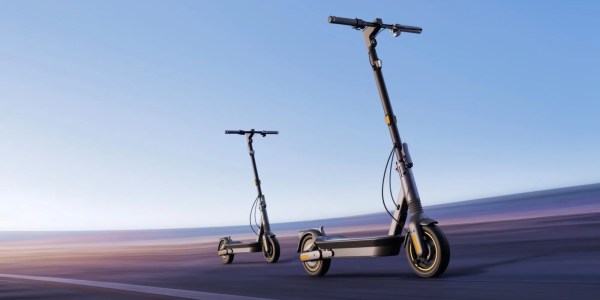 Two scooters on a road