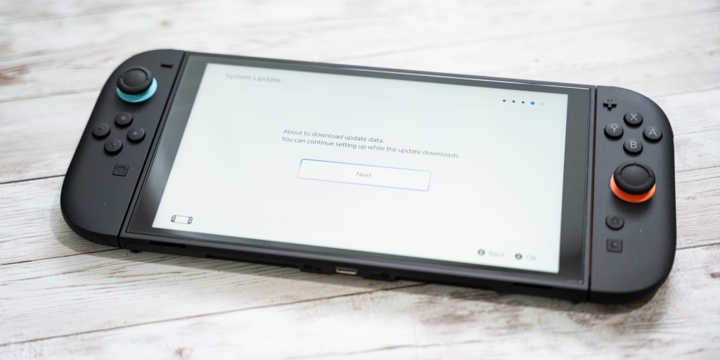 A black rectangular device with a white screen