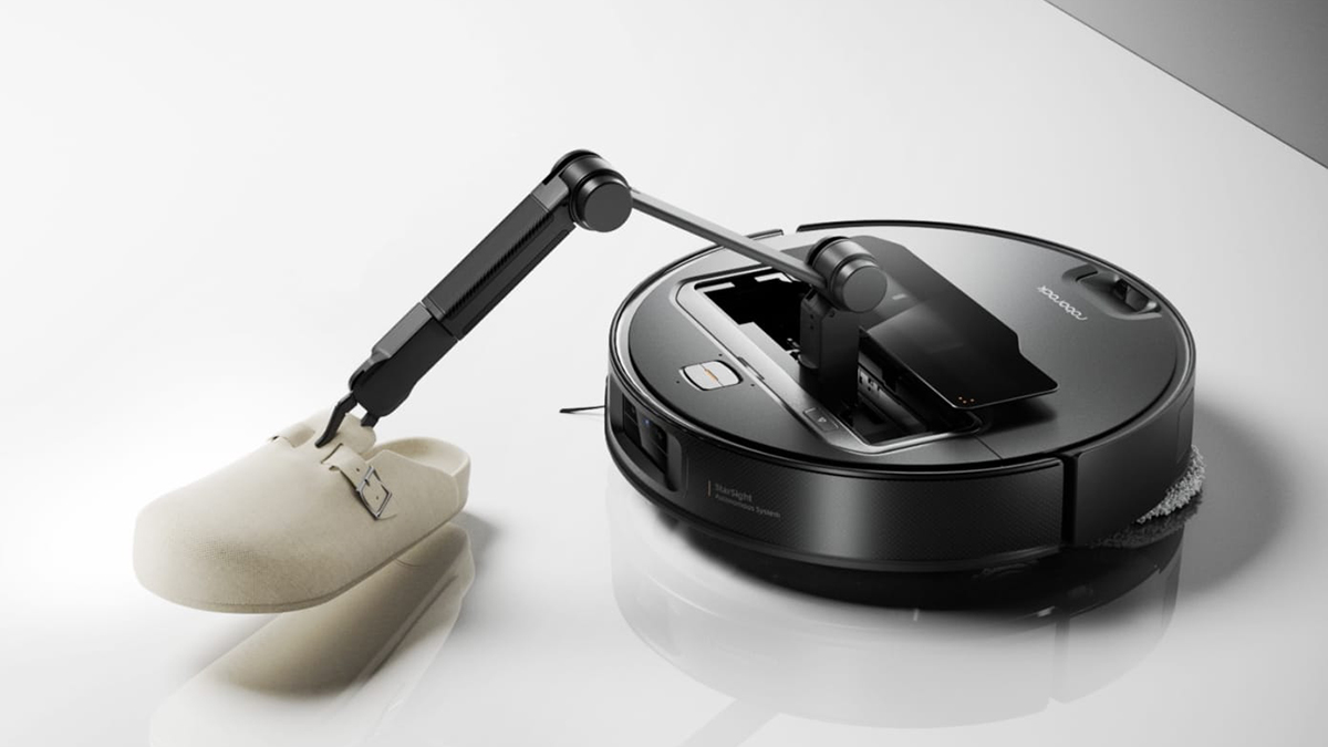 A robotic arm with a white glove