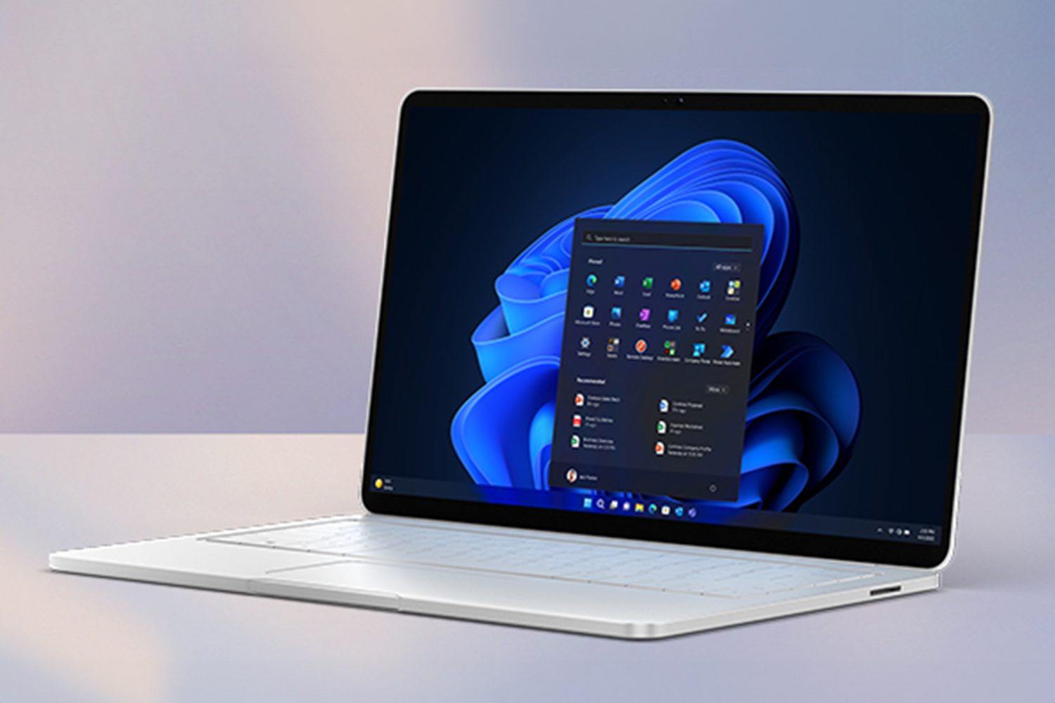 A laptop with a blue flower on the screen