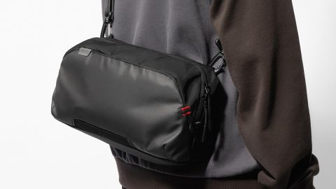 A person wearing a black bag