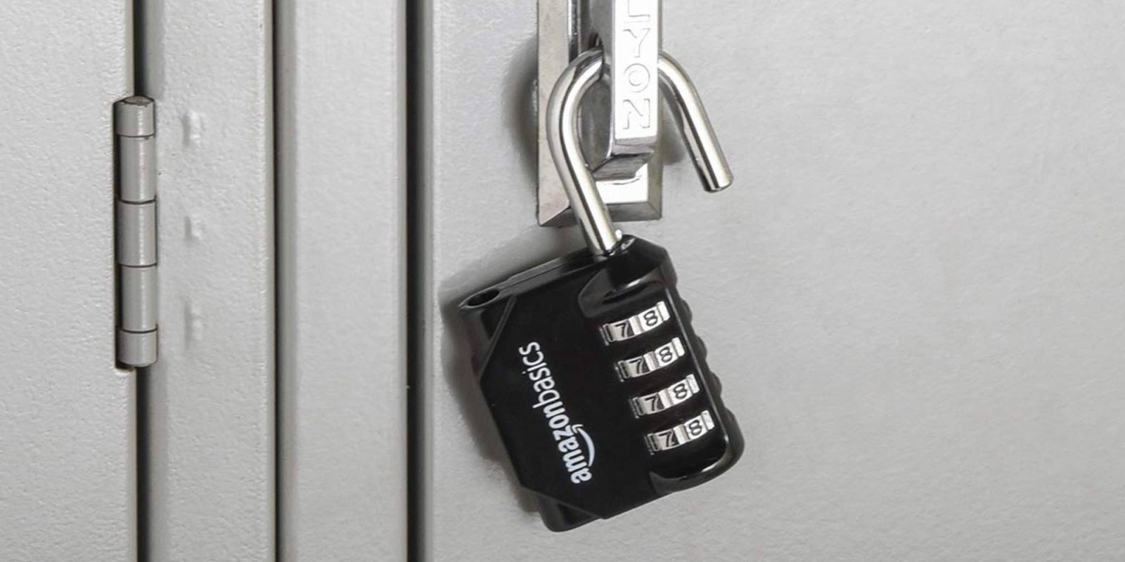 A black padlock with a silver handle