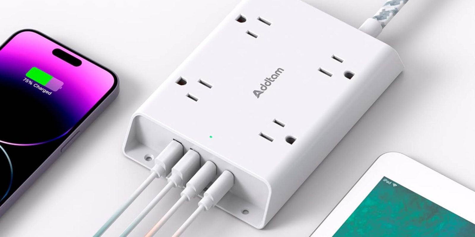 A white electrical outlet with multiple plugs