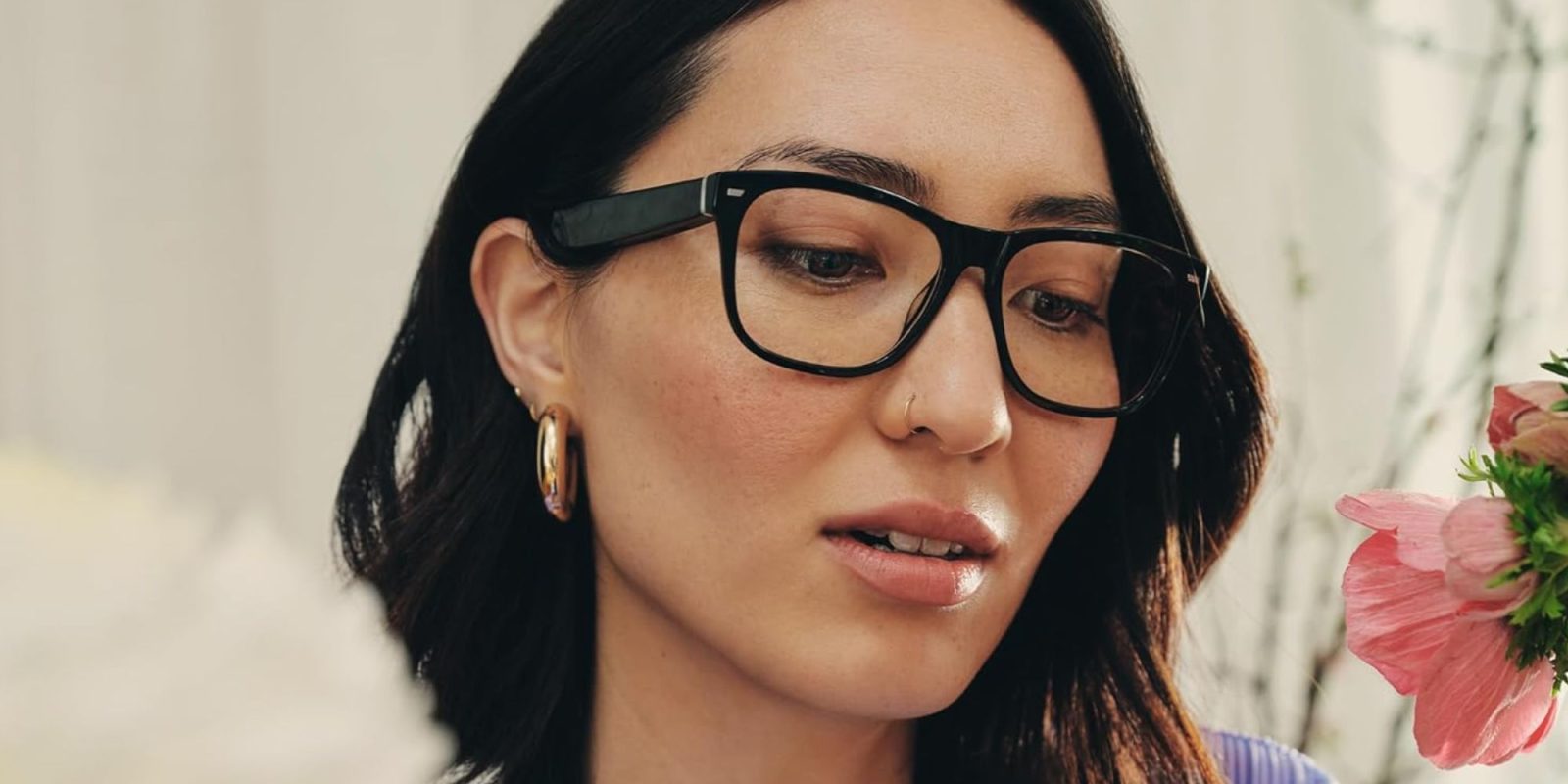 Image showing a person wearing Amazon's Echo Frames glasses.
