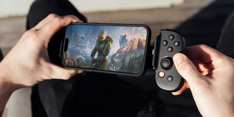 A person holding a phone with a game on it