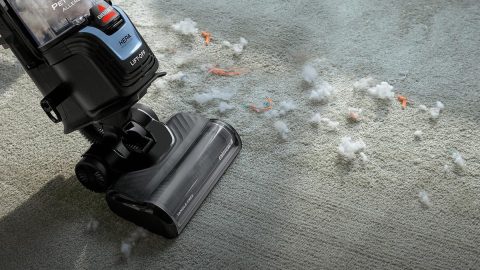 A vacuum cleaner on the floor