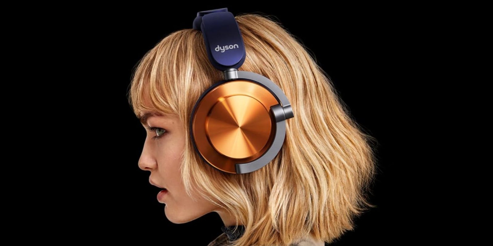Image showing a woman wearing Dyson's OnTrac headphones.