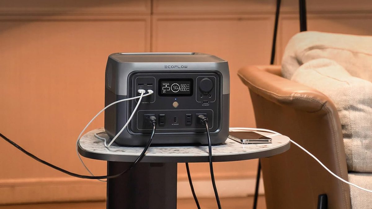 A rectangular box with wires on a table