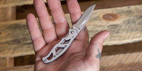 A hand holding a knife