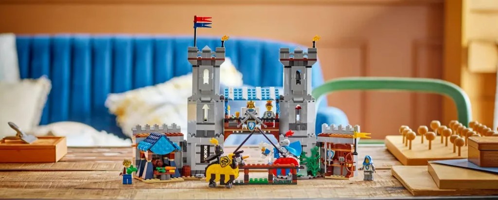 A toy castle with a horse and a horse