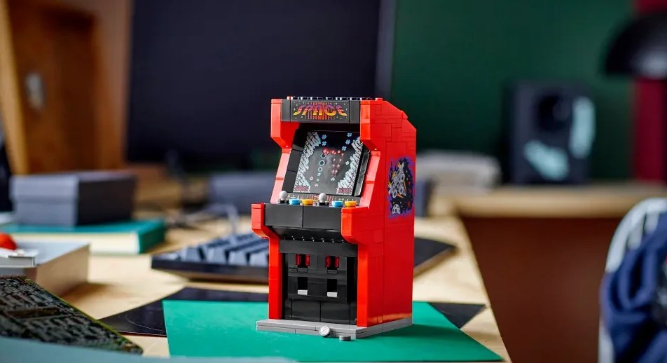 A red arcade game on a table