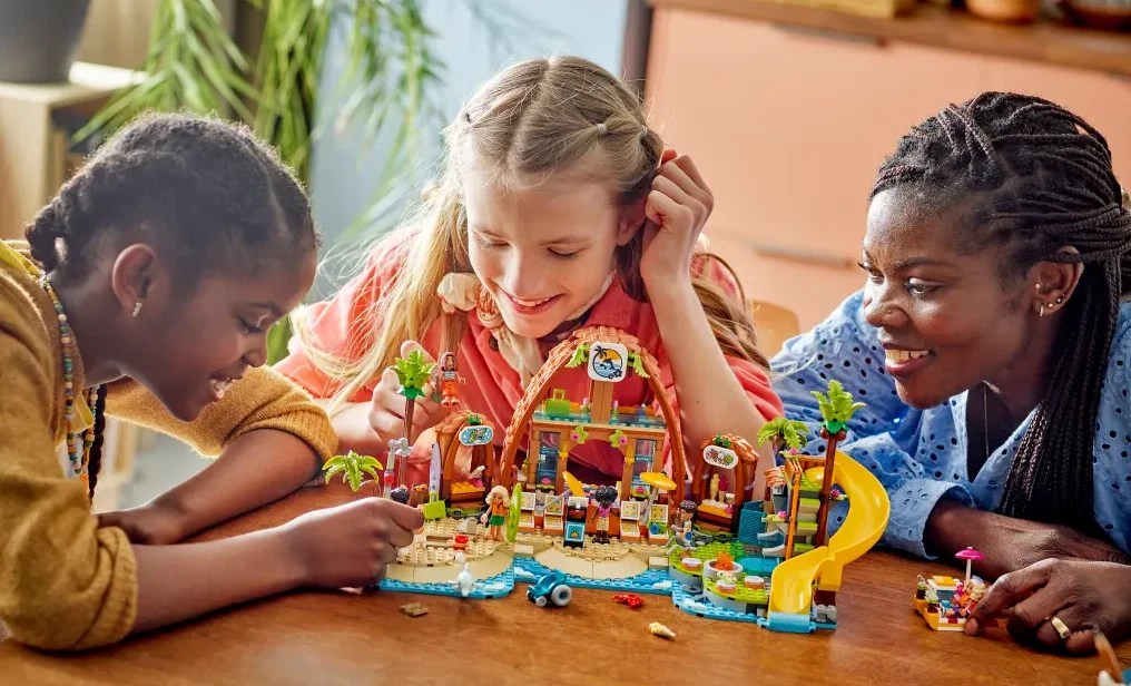 A group of children playing with a toy