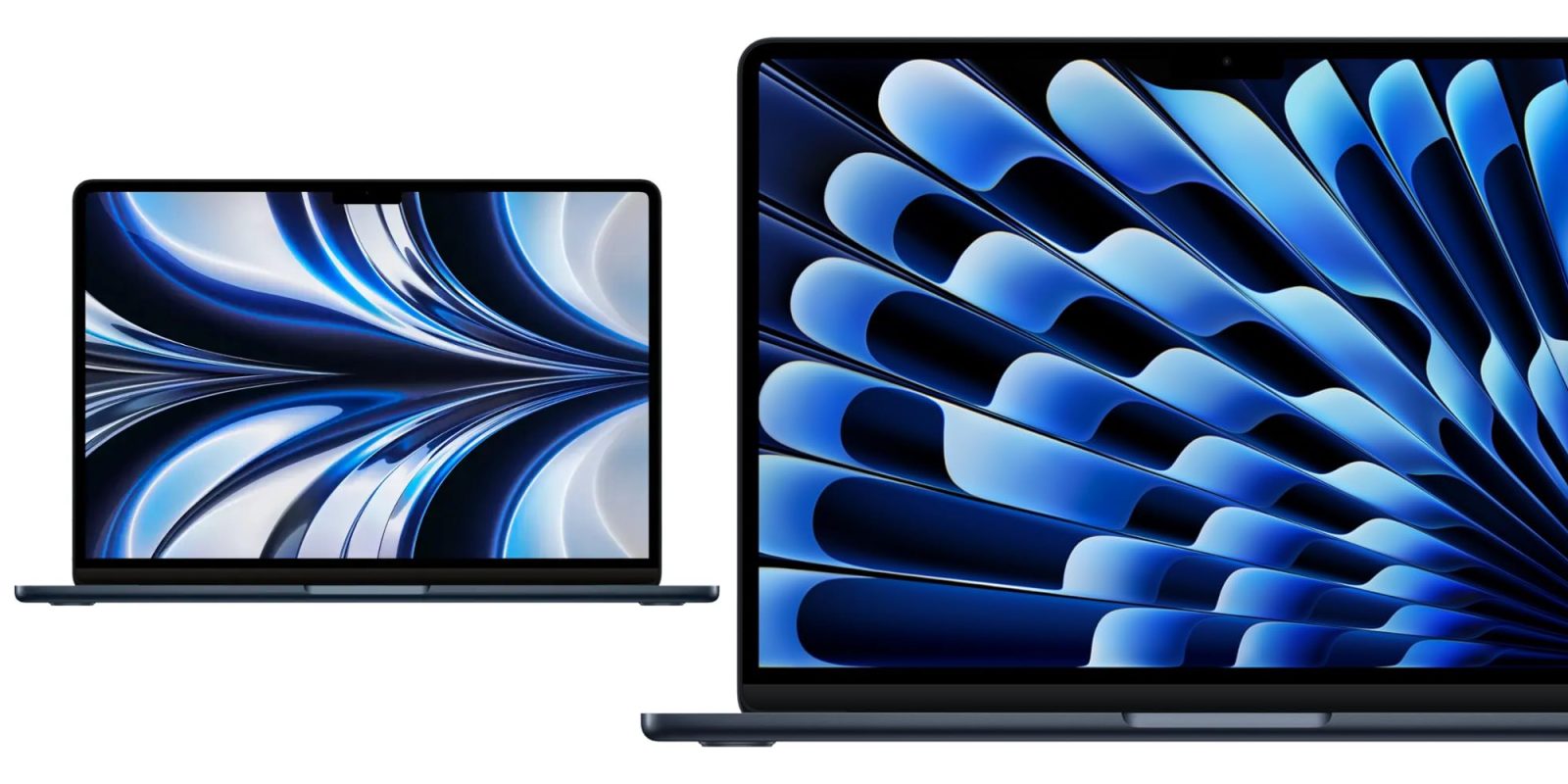 A laptop and tablet with a blue design on the screen