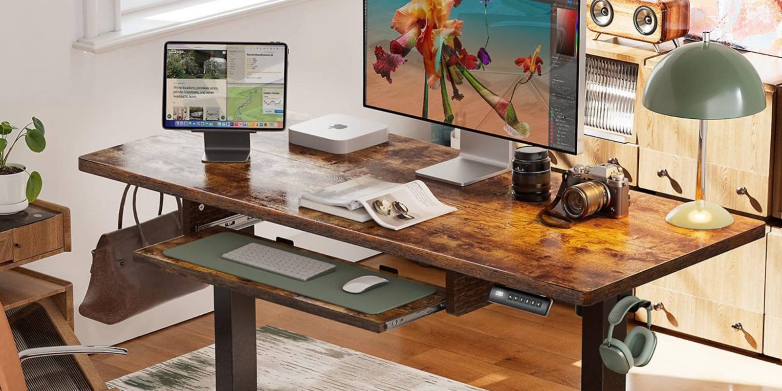 A desk with a computer and a monitor