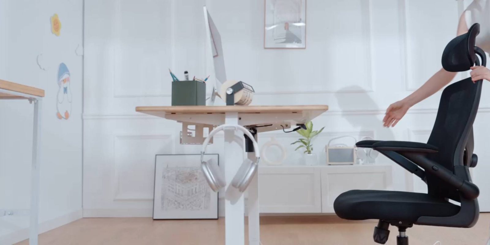 A desk with headphones on top of it