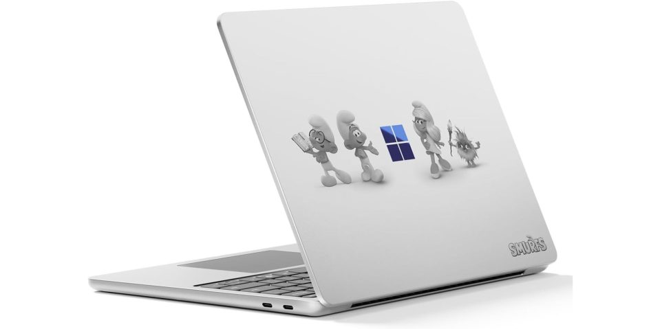 A laptop with cartoon characters on the back