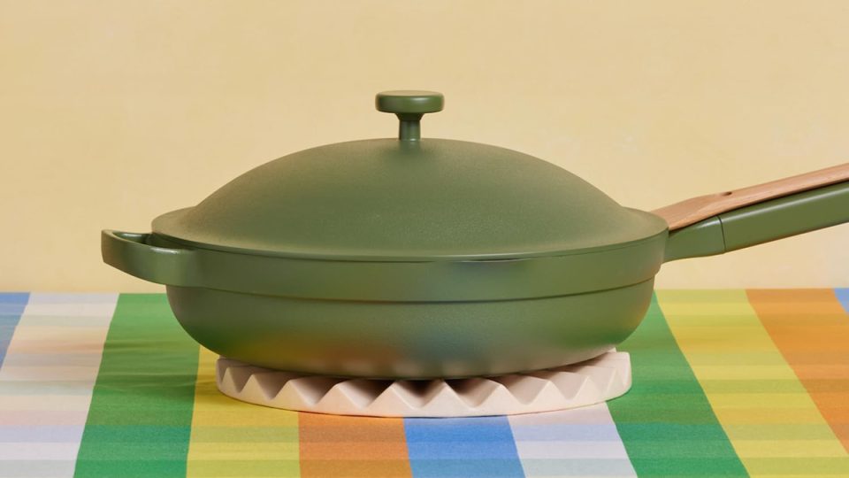 A green pot on a table