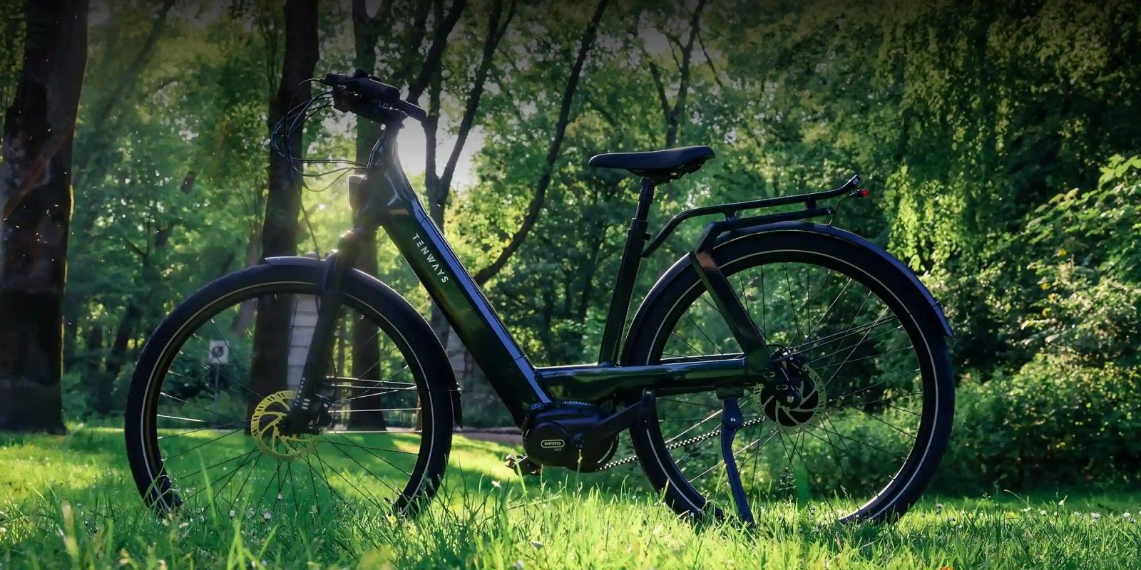 A bicycle parked in the grass